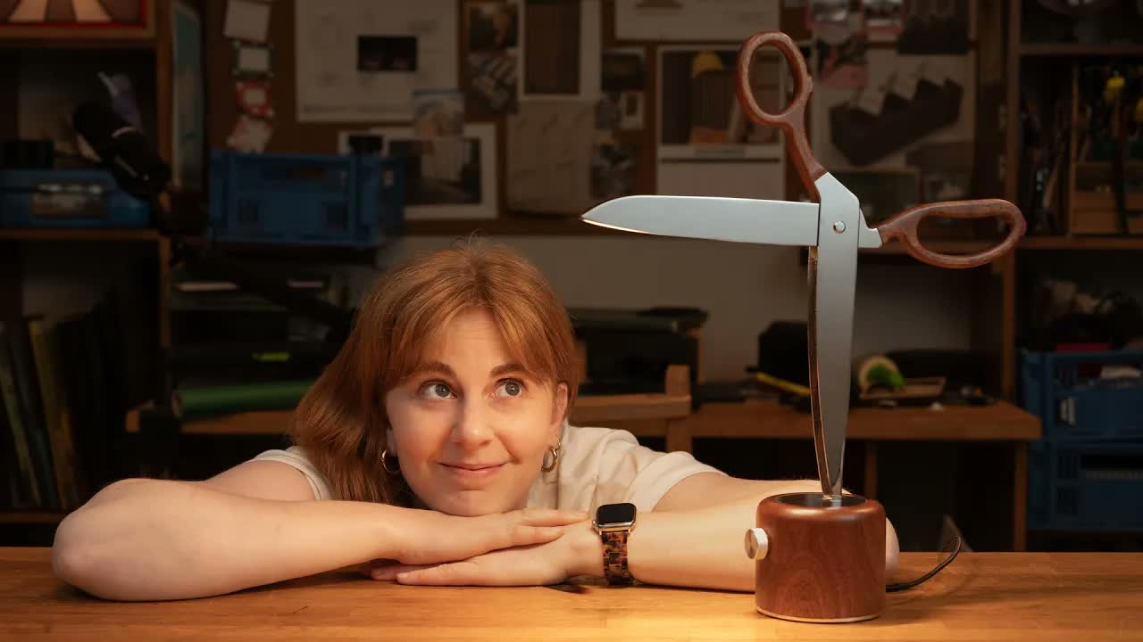 This lamp looks like a pair of scissors